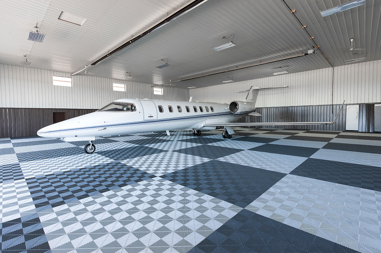 Image of the International Air Charter Learjet 45 in its hangar.